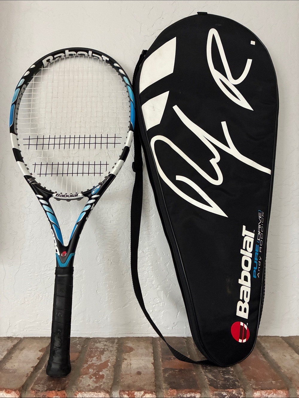 BABOLAT Good Blue/White Tennis Racket with Black/White Babolat Case With Strap.